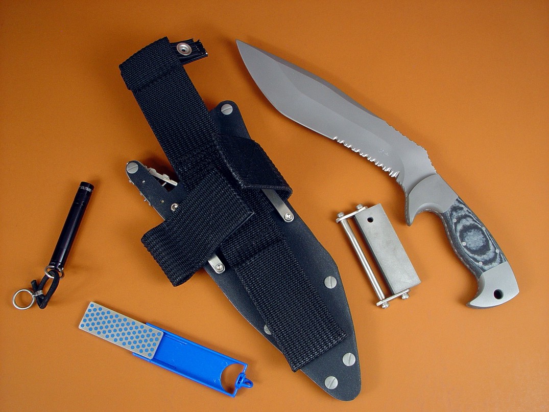 "Kneph" with full knife sheath belt loop extender accessory package including diamond pad sharpener, magnesium/firesteel fire starter, Maglite solitaire flashlight "Kneph" with full knife sheath belt loop extender accessory package including diamond pad sharpener, magnesium/firesteel fire starter, Maglite solitaire flashlight
