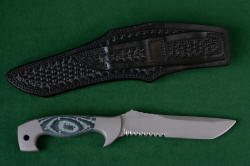"Arctica" reverse side, leather sheath back view. Sheath belt loops are dual, high and low, both stitched wtih double row nylon stitching for strength. All surfaces are toole and sealed, even the sheath back.
