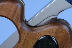 "Concordia" Custom Fine Chef's Knife, knife is bedded, protected, secured, and safe in stand, with cutout and form to accommodate front bolster spine extension and thumb rest