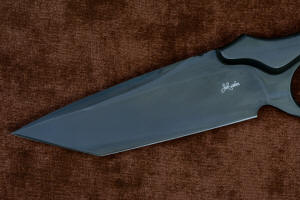 "Contego" Counterterrorism Tactical Knife, obverse side blade detail, in T3 cryogenically treated CPM154CM  powder metal technology high molybdenum martensitic stainless steel blade, 304 stainless steel bolsters, Black/Gray G10 fiberglass/epoxy composite handle, hybrid tension tab-locking sheath in kydex, anodized aluminum, stainless steel, titanium