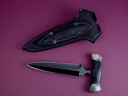 "Grim Reaper" reverse side view. Note panel inlay of stingray skin on sheath belt loop, thick and substantial knife spine