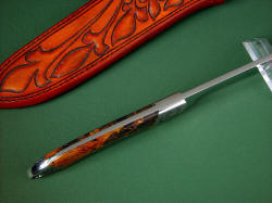 "Magdalena Magnum" spine view. Spine and tang are clean and corrosion resistant, smooth and polished. Bolsters are dovetailed and permanently peened to the tang with heavy stainless steel through-pins. 