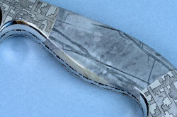 "Toroweap" custom knife sculpture in hand-cast bronze, 440C high chromium stainless steel blade, 304 hand-engraved stainless steel bolsters, Picasso Marble gemstone handle