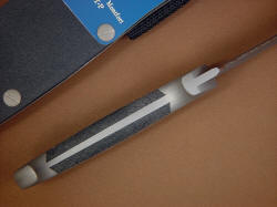 "PJ" inside handle tang view. Scales are bedded and solid, secured with eight stainless steel pins, all surfaces are contoured, rounded an finished for a comfortable grip