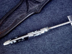 "Patriot" spine edgework, filework detail. Filework is modified vine, throughout fully tapered tang