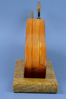 "Sasserides and Courgette" fine handmade  bread knife set, block view, front end. Block is made of American Black Cherry Hardwood, base is Kashmir granite from India