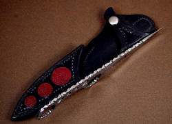 "Shank" spined edgework, filework detail. Work is modified vine pattern