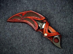 "Triton" Kerambit , sheathed view. Sheath displays handle while protecting wearer from double edged knife blade