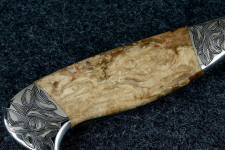Petrified Fern Wood has unusual patterns of grain and this one has plentiful worm holes, all replaced by stone