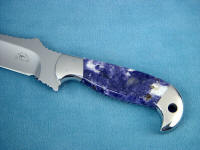 Scapolite in blue sodalite, calcite matrix 