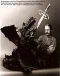 Dragonslayer with artist. This is a large piece, with 400 lbs of cast bronze and a 56" wingspan